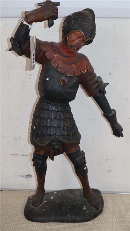 A Continental carved polychrome figure of a swordsman